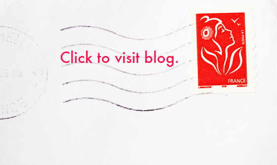 red stamp on postcard with blog external link